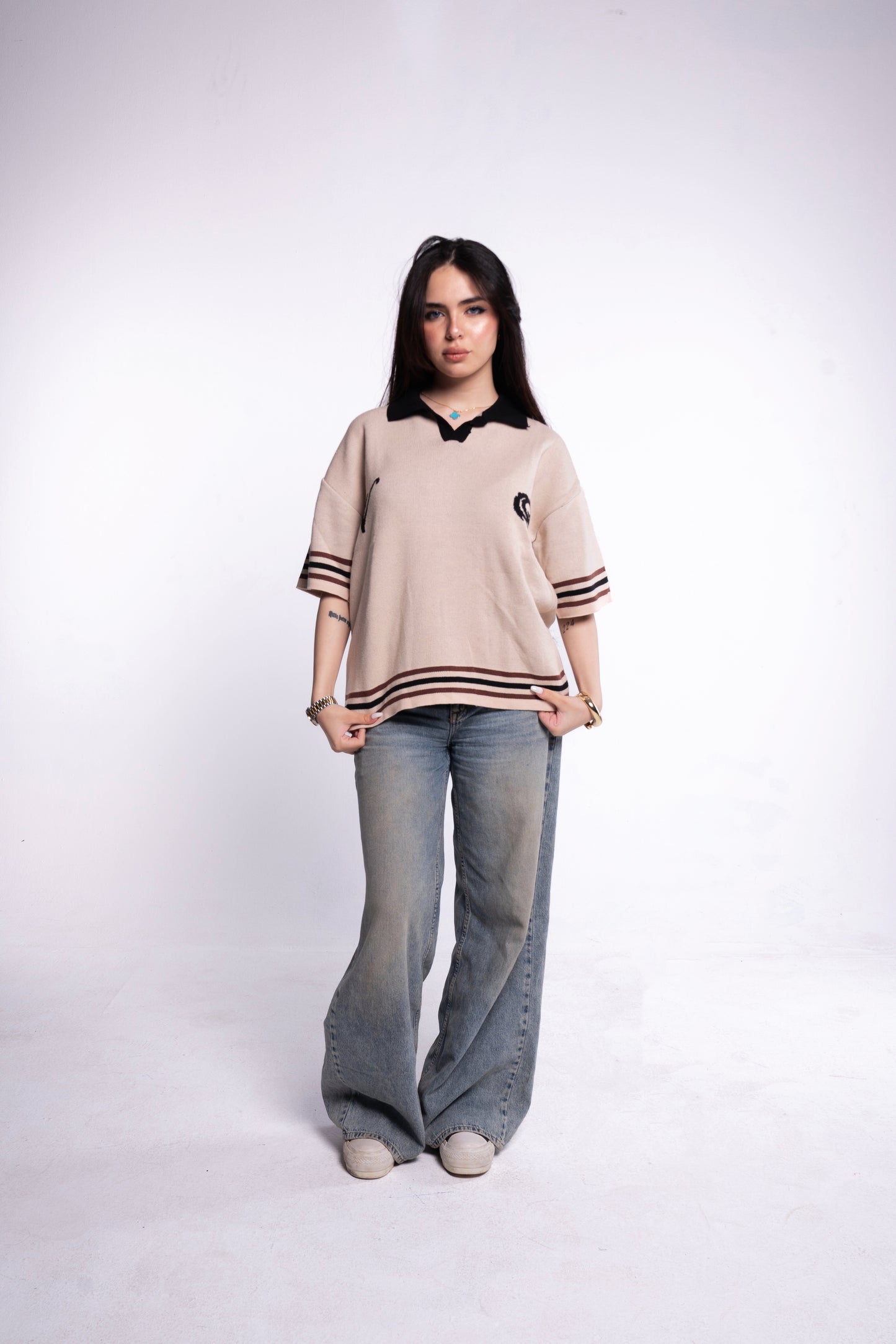Beige knitted polo